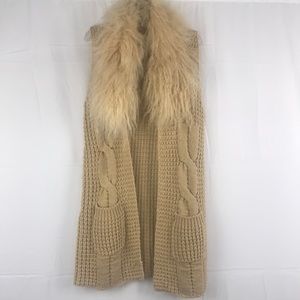 Mid-length, open vest